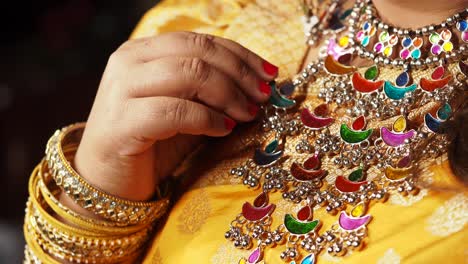 indian woman wearing traditional jewelry