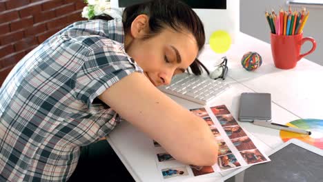 tired business executive sleeping at her desk