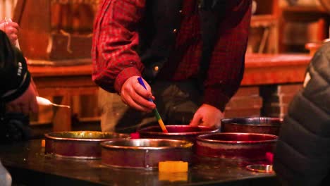 demonstration of candle making process