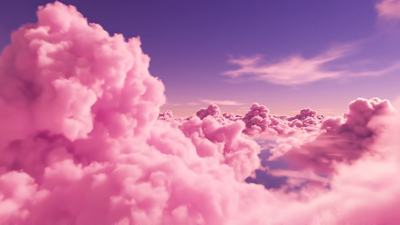 Dreamy Pink Fluffy Clouds Floating in a Purple Sky