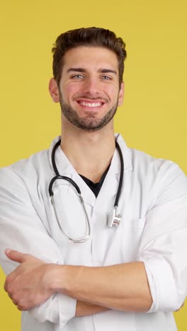 portrait of a smiling male doctor in a lab coat