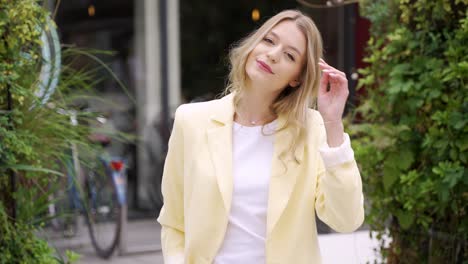 young woman in yellow blazer