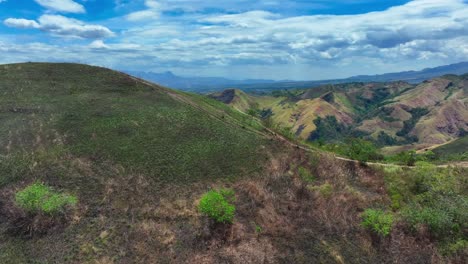 Aerial-panorama-of-mountain-landscape-with-path-during-sunny-day-in-South-Philippines