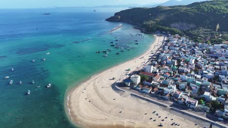 aerial view of a coastal village and beach