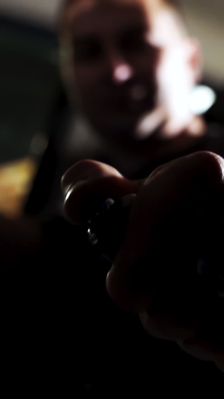 Person Holding a Lighter