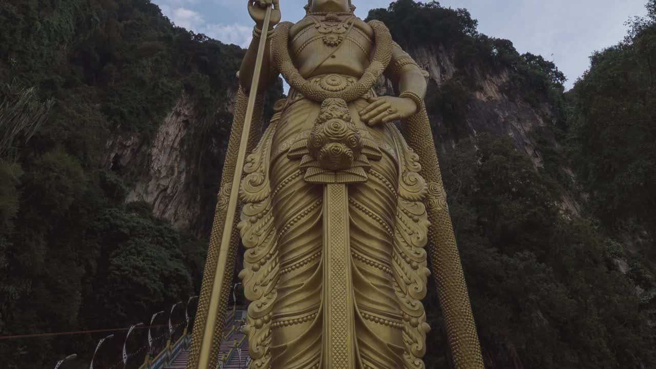 Golden Statue of a Hindu Deity at Batu Caves, Malaysia