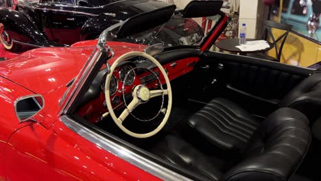classic red mercedes-benz convertible