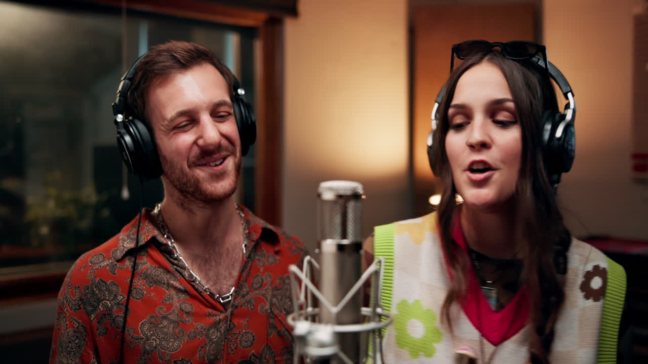 Singers Recording a Duet in a Music Studio