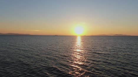 Golden-sunset-over-the-sea-in-South-Athens,-Greece