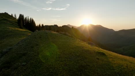 aerial over backcountry mountain range and forest at sunset-2