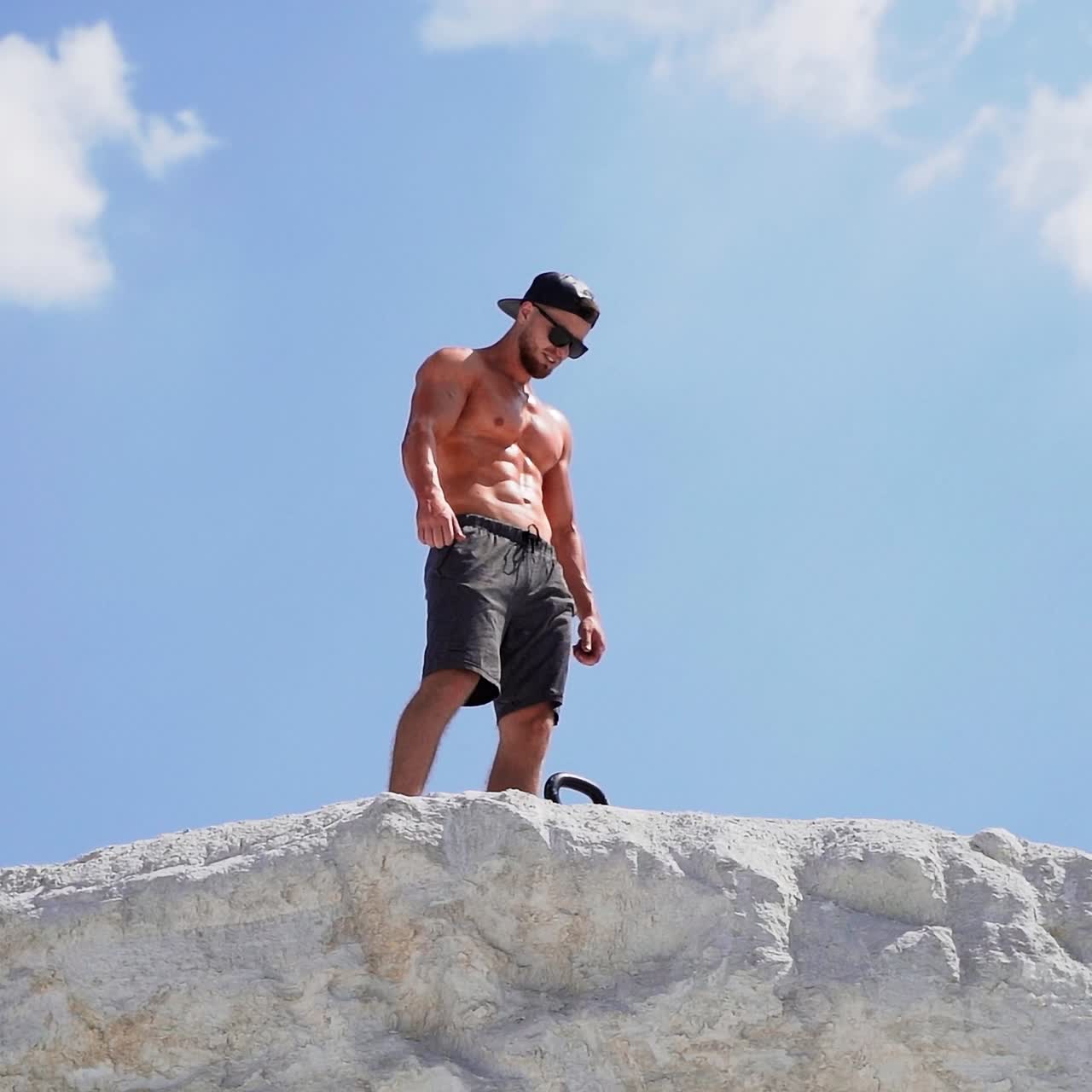 Sportive man training outdoors