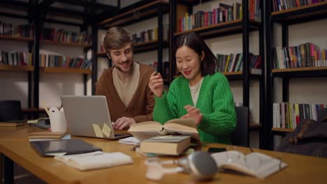 students studying together in a library