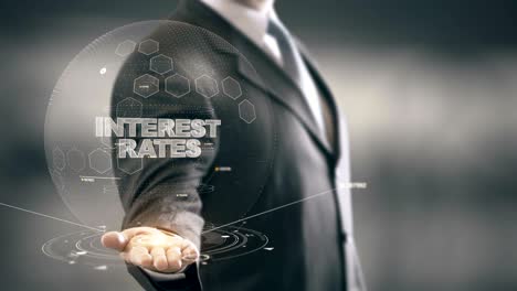 interest rates with hologram businessman concept