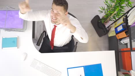 businessman dancing, rejoicing.