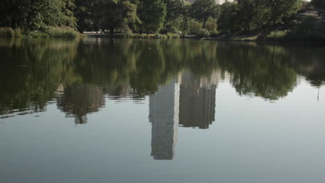 High-Rise-Buildings-Reflected-in-Pond-at-Park-in-the-City-2