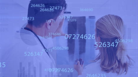 animation of data processing over caucasian female and male doctor studying x ray