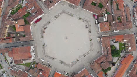 rotated top-down view of radial symmetry with streets converging toward the center