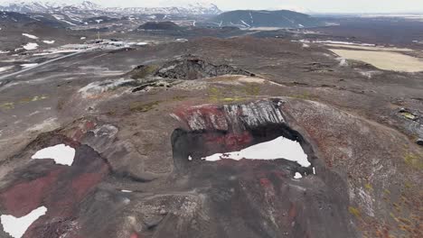 the view of an unidentified volcano near myvatn at reykjahlid in iceland captures the magnificent beauty of the black and gray mountain landscape