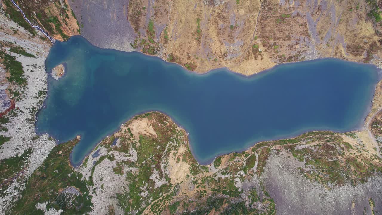 Aerial view of Ilhéou Lake in Pyrenees, perfect for hiking adventures