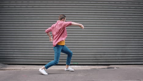 dance loop funny man dancing in street having fun celebrating with funky looping dance 4k