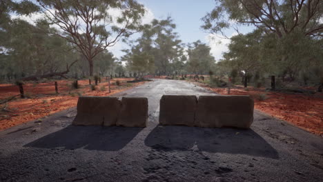 old-rusted-concrete-road-barrier-blocks