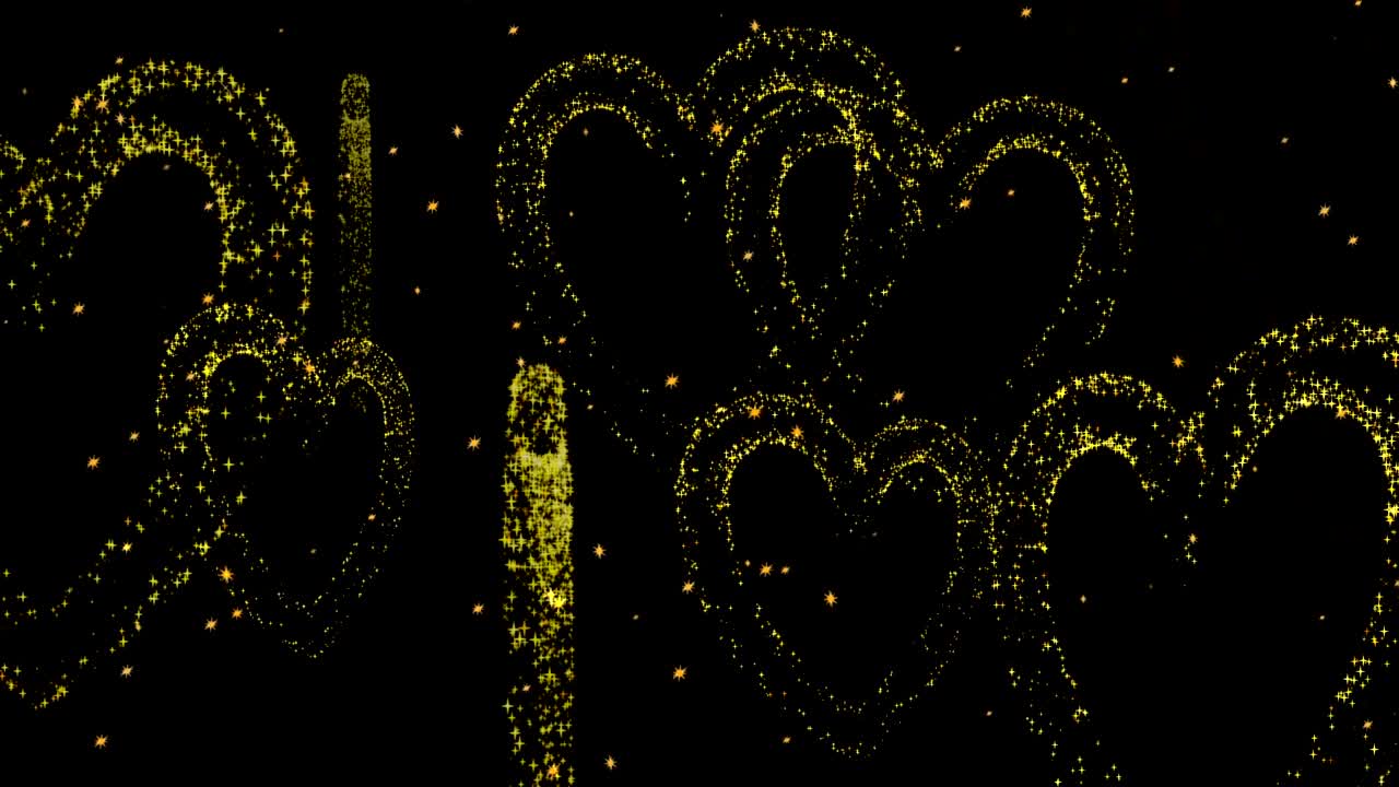 黒い背景の金色の輝くハート