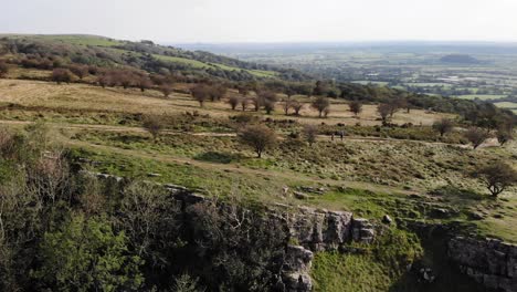 scenic aerial view across cheddar gorge landscape with people walking