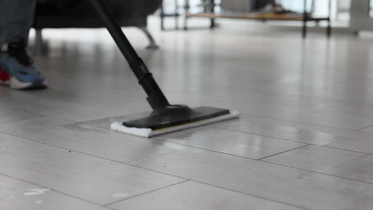 Cleaning hardwood floors with a mop