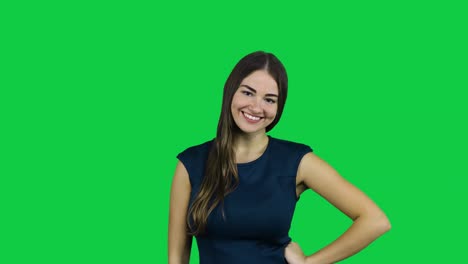 Girl-call-camera-with-one-finger-in-front-of-a-green-screen