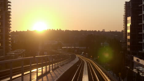 A-Fascinating-Sunset-At-Millennium-Line-Covered-With-High-Rise-Buildings-and-A-Glimpse-Of-Its-City---Front-view-Shot