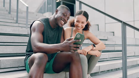 couple checking fitness app on phone