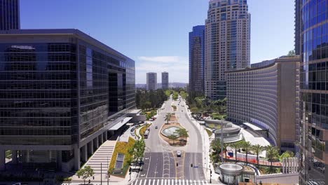 low aerial shot flying over avenue of the stars in century city, california