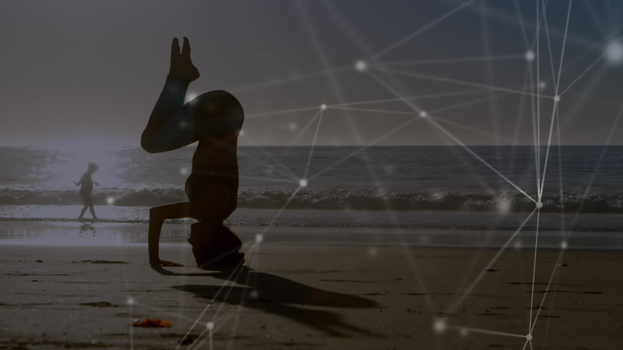 해변에서 요가를 연습하는 백인 여성에 대한 연결 네트워크의 활성화