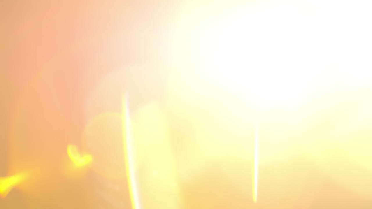 Warm lens flare light transition from flash