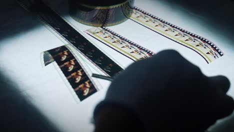 film reels and strips on a table