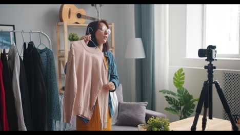 Fashion Vlogger Reviewing a Pink Sweatshirt