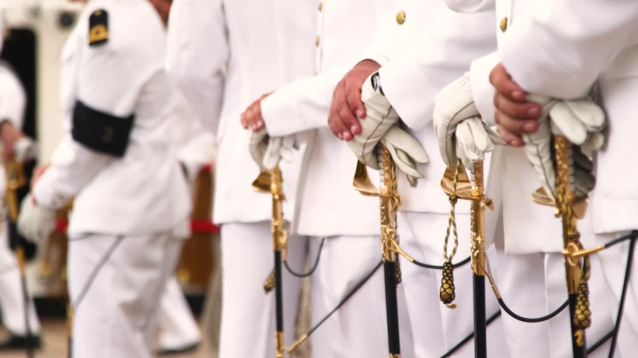 Detail hand shot of sailors during official ceremony at Navio Escola Sagres in Rio de Janeiro, Brazil