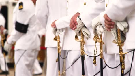 detail hand shot of sailors during official ceremony at navio escola sagres in rio de janeiro, brazil