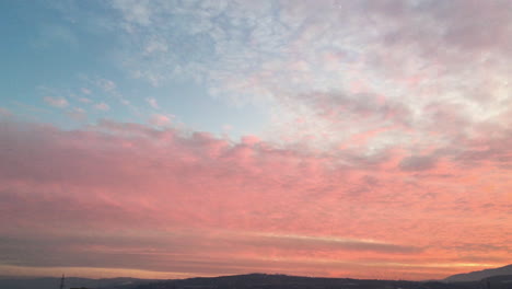 view of beautiful red clouds and sunset over the mountain