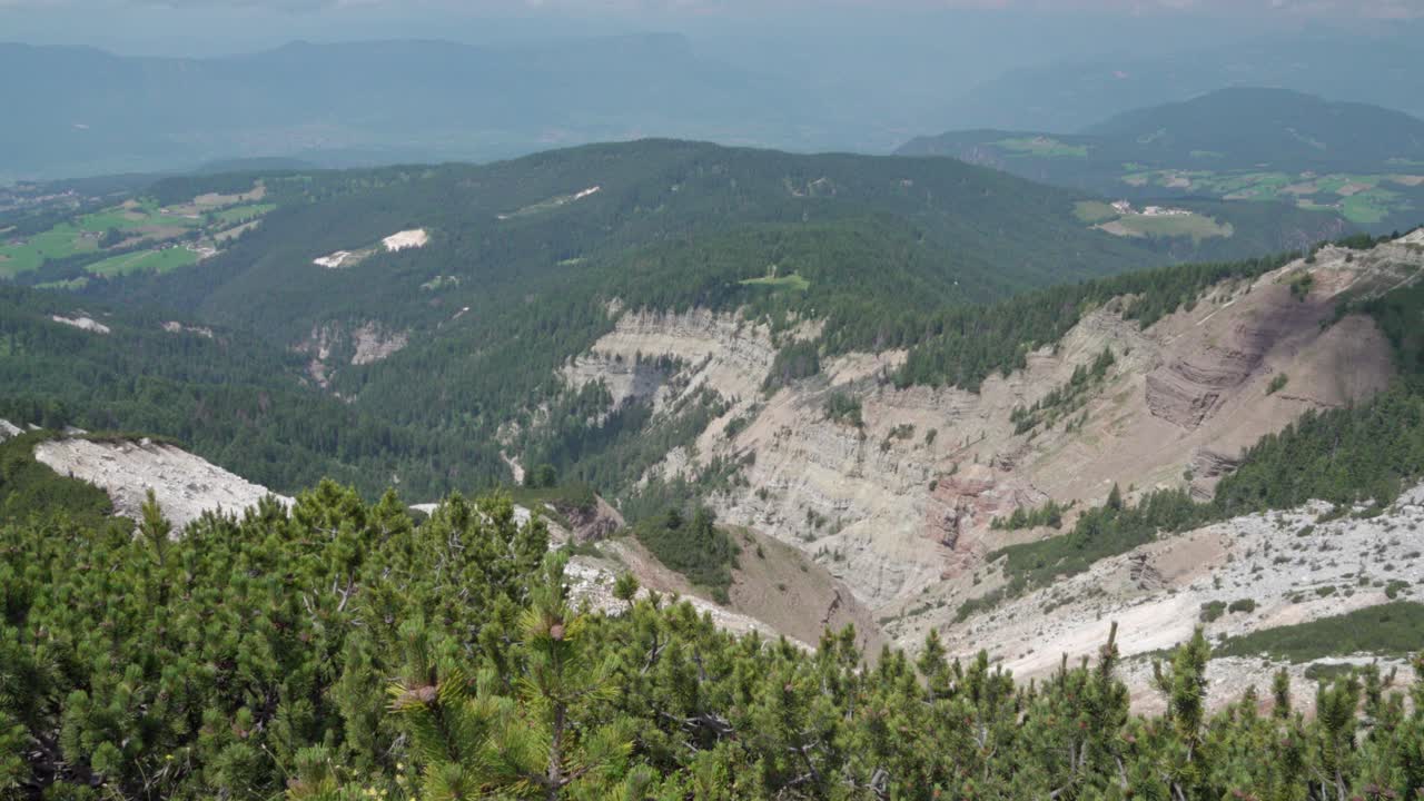 View into the Bletterbach Gorge from above at the foot of the Weisshorn peak near Aldein, South Tyrol, Italy
