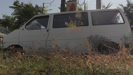 destroyed car van in a destroyed landscape