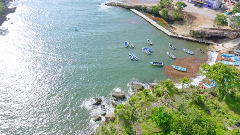 Local-fishing-boats-anchored-in-harbour,-Boca-de-Yuma,-Caribbean