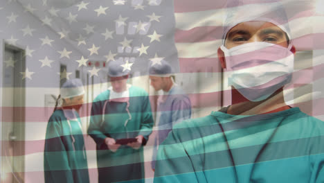 animation of flag of usa waving over surgeons in operating theatre