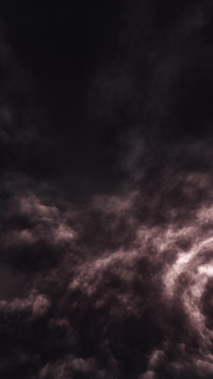 Churning dark volcanic or thunder clouds illuminated by a moody red and golden glow. Powerful vertical background asset for dramatic cinematic intros, music videos, and gaming.