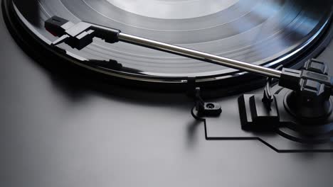 removing vinyl record from a turntable. process of putting aside lp from a record player