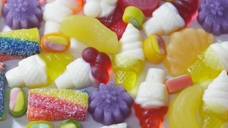 variety of sweet colorful marmalade jelly candies. rotation video