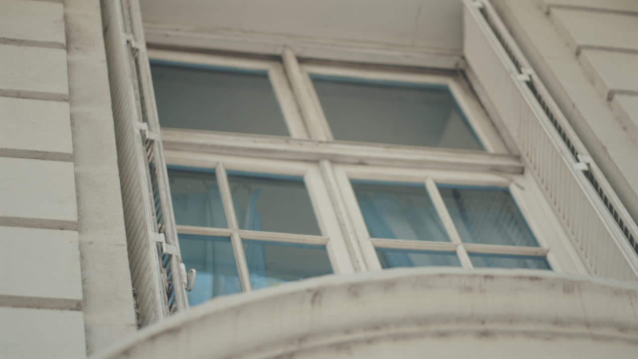 Close-up of traditional window in building with old architecture in Buenos Aires, Argentina.