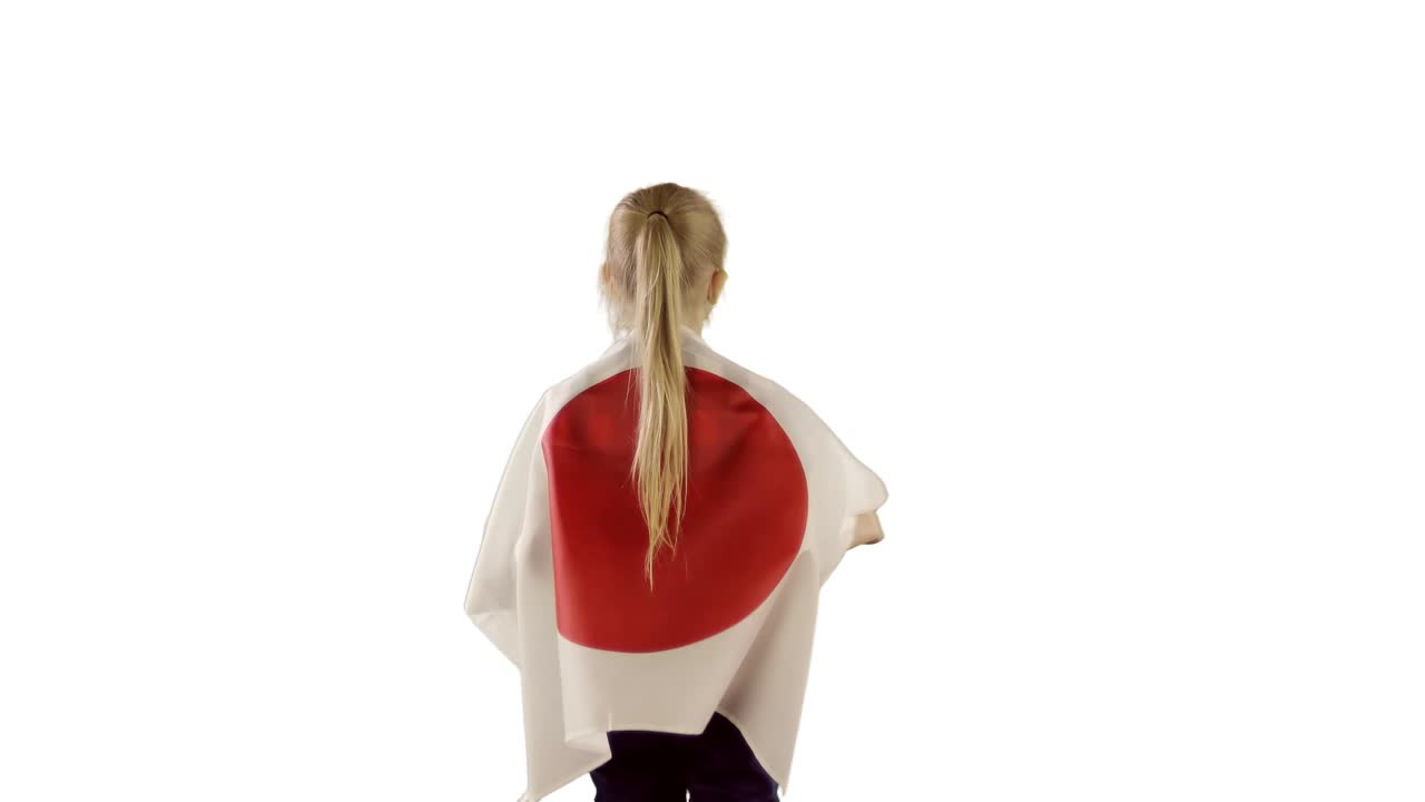 Blonde girl stands back and raises a Japanese on white background.
