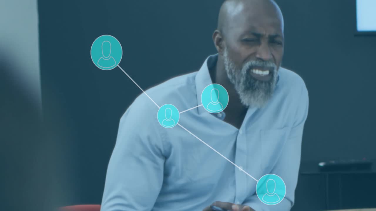 Animation of network of connections and icons over business people in office