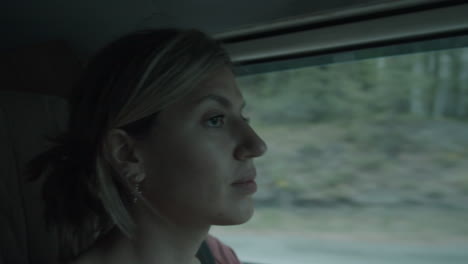 young woman driving car